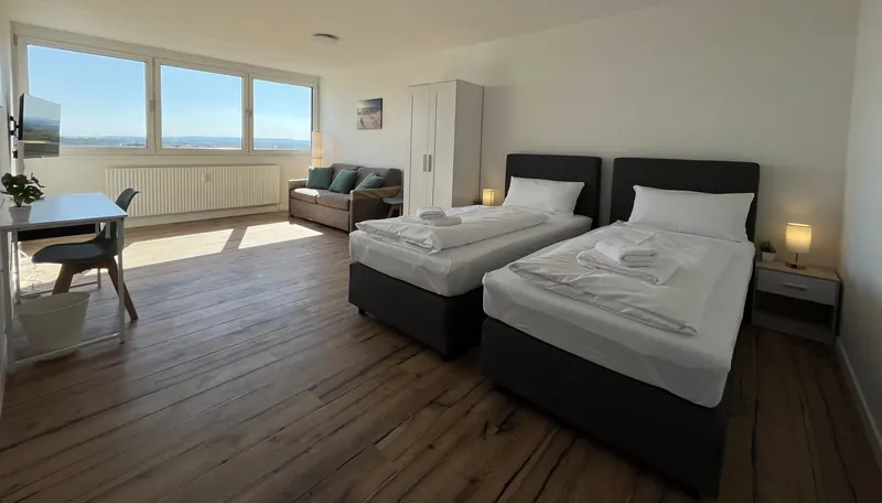 Wohnung, Foto 1: Zimmer mit zwei Einzelbetten